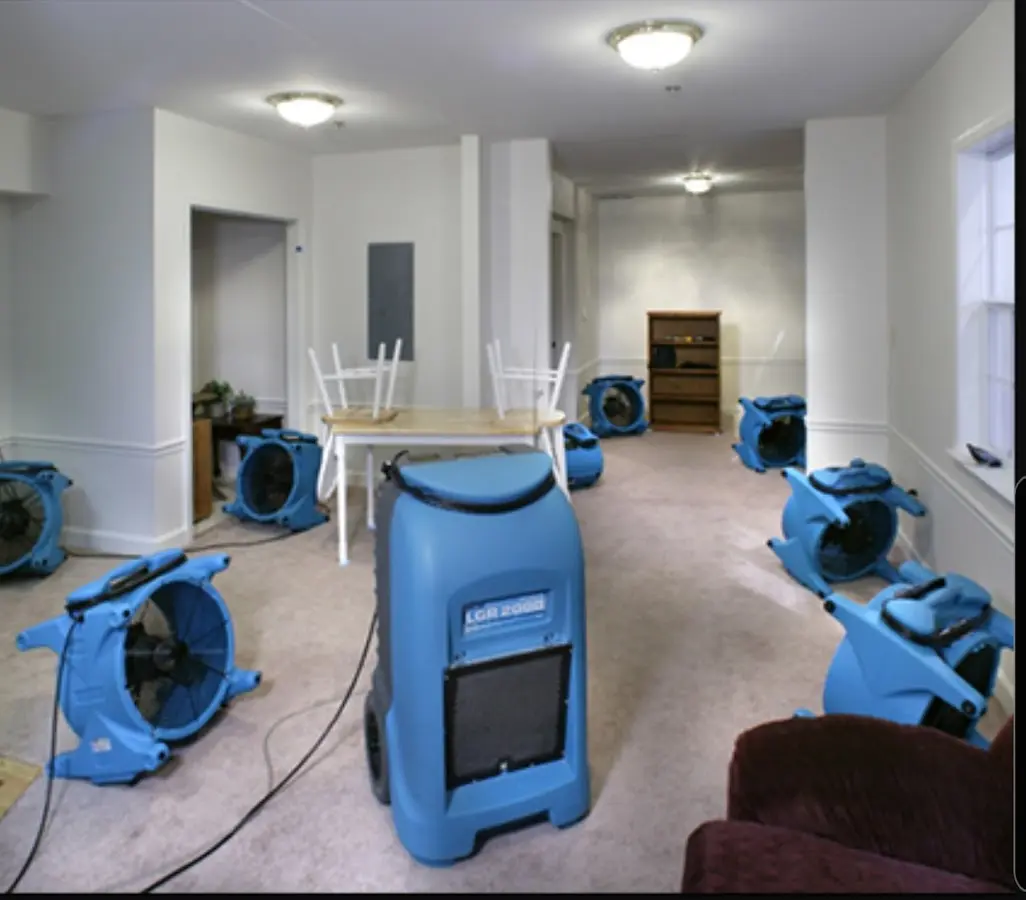 Air movers and dehumidifier setup for Water Damage Restoration in St. Marys